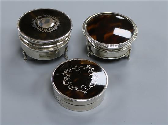 Three circular silver and tortoiseshell trinket boxes, two with pique decoration